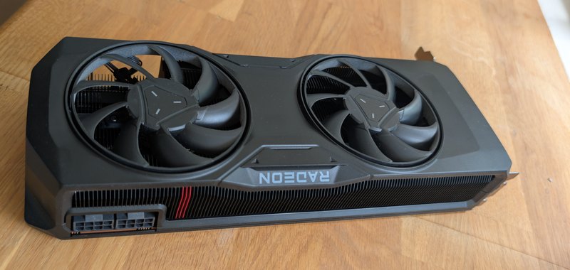 AMD Radeon RX 7800 XT reference-design graphics card, photographed from above.